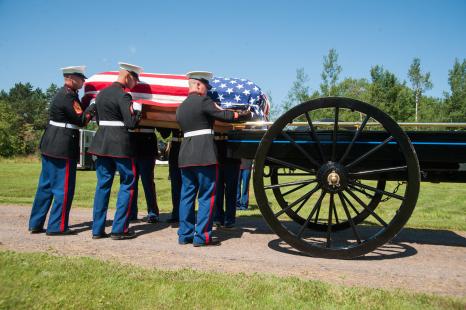 Marines loading USMC Sgt James Joseph Hubert onto caisson