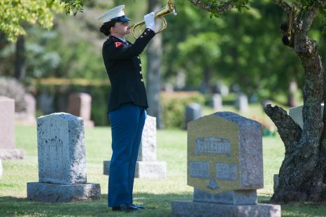 Marine bugler playing 'Taps' for USMC Sgt James Joseph Hubert 